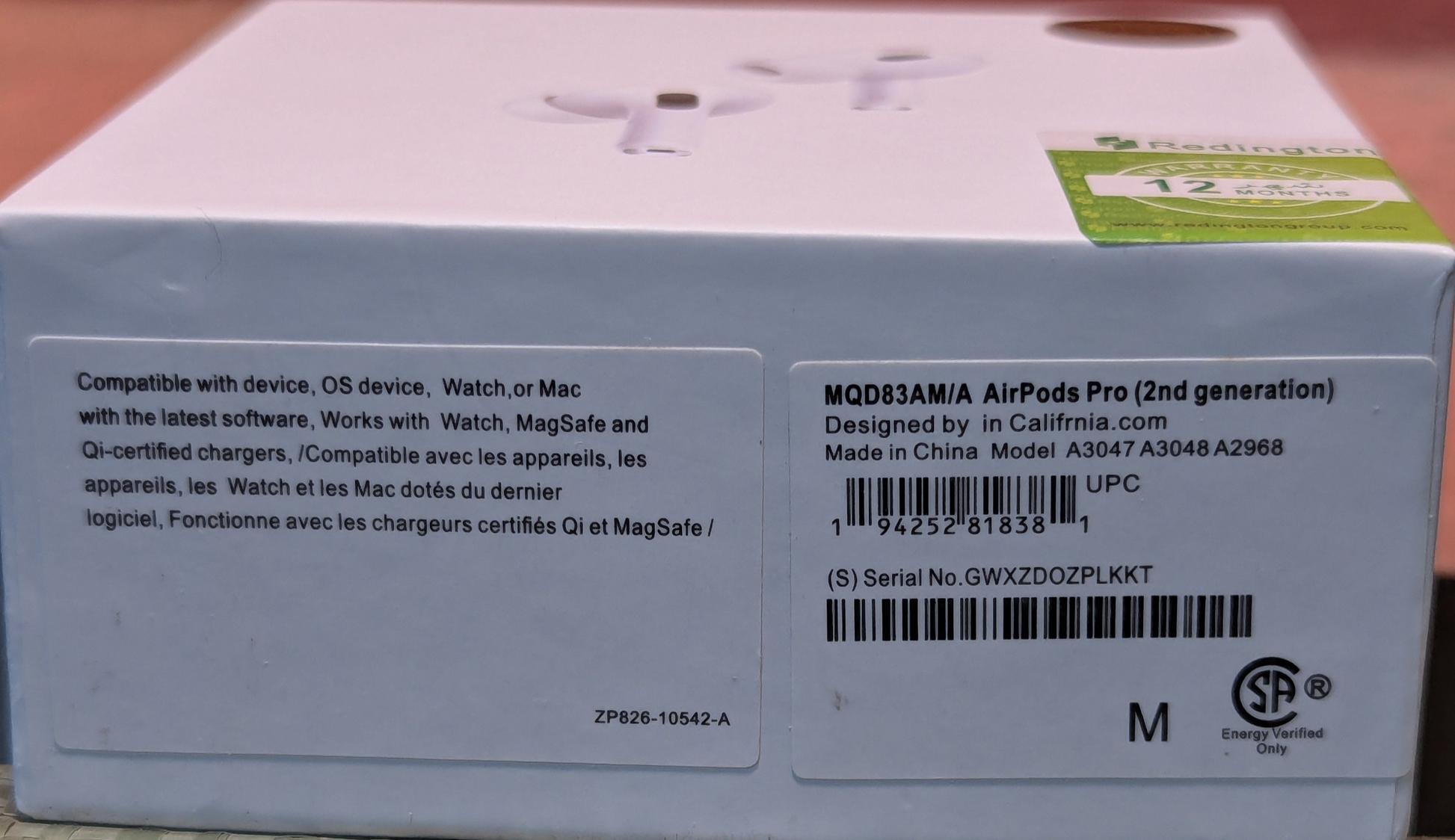 Box of Apple AirPods Pro on a surface with a blurred background